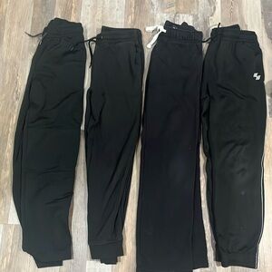 Lot of 4 boys black pants